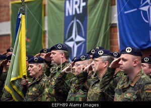 NATO_soldiers-of-the-1st-germannetherlands-corps-salute-during-eefh89